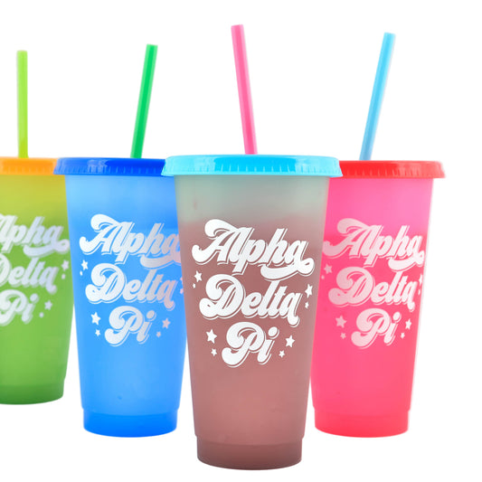 Four colorful tumblers with straws featuring 'Alpha Delta Pi' text on a white background.
