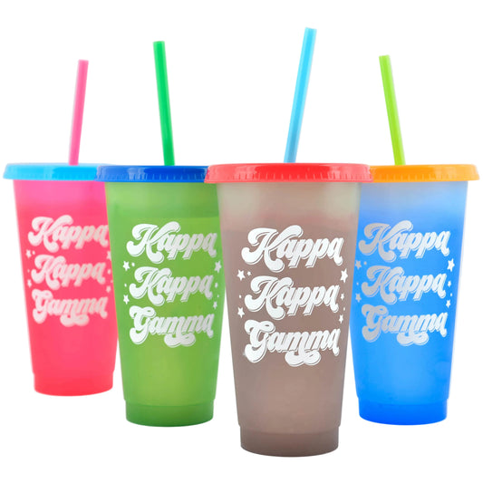 Four colorful tumblers with 'Kappa Kappa Gamma' text on a white background